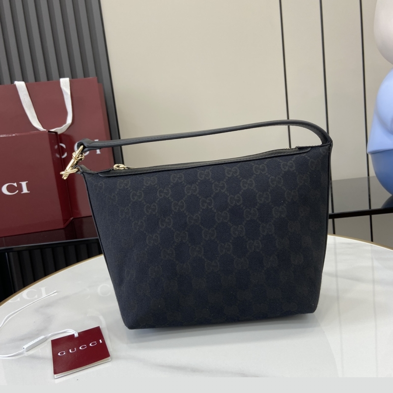 G*u*i top handle bags